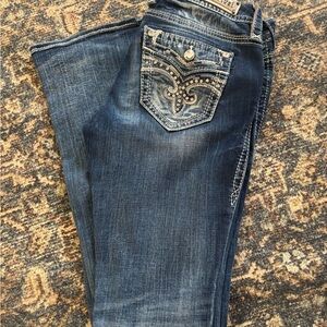 Stylish Blue Jeans with Embellished Pockets